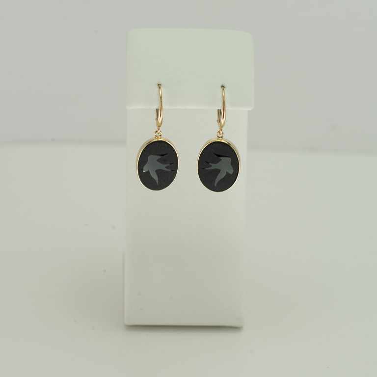 These bird earrings are one-of-a-kind. There is a pendant to match, that is sold separately. The birds have been carved into black onyx.