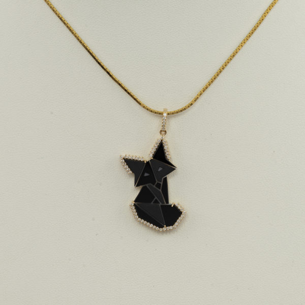 This black fox pendant has diamond accents. Both the diamonds and the agate cameo have been set in 14kt yellow gold. The chain is sold separately. 