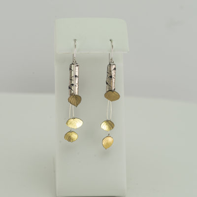 These are the short aspen earrings by Wolfgang Vaatz. They were made with argentium silver, sterling silver and 18kt gold.