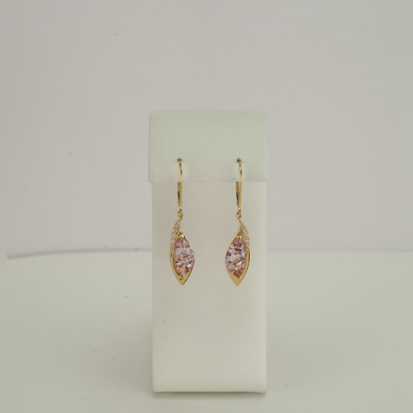 Here are morganite earrings in 18kt yellow gold with diamond accents.