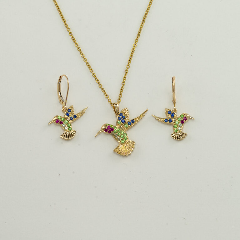 Hummingbird collection in 14kt yellow gold. Made with diamonds, rubies, sapphires and tsavorite garnets. Chain is not included.
