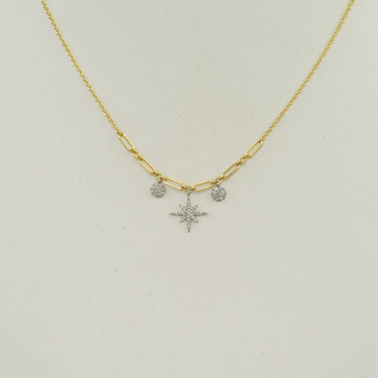 This Meira T star necklace has white diamond accents. All the diamonds have been set in 14kt yellow gold. The chain is adjustable in length.