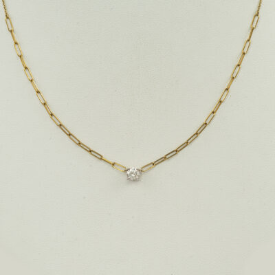 Here is a Meira T paperclip necklace. It has a brilliant cut diamond as the centerpiece. The gold is 14kt yellow.