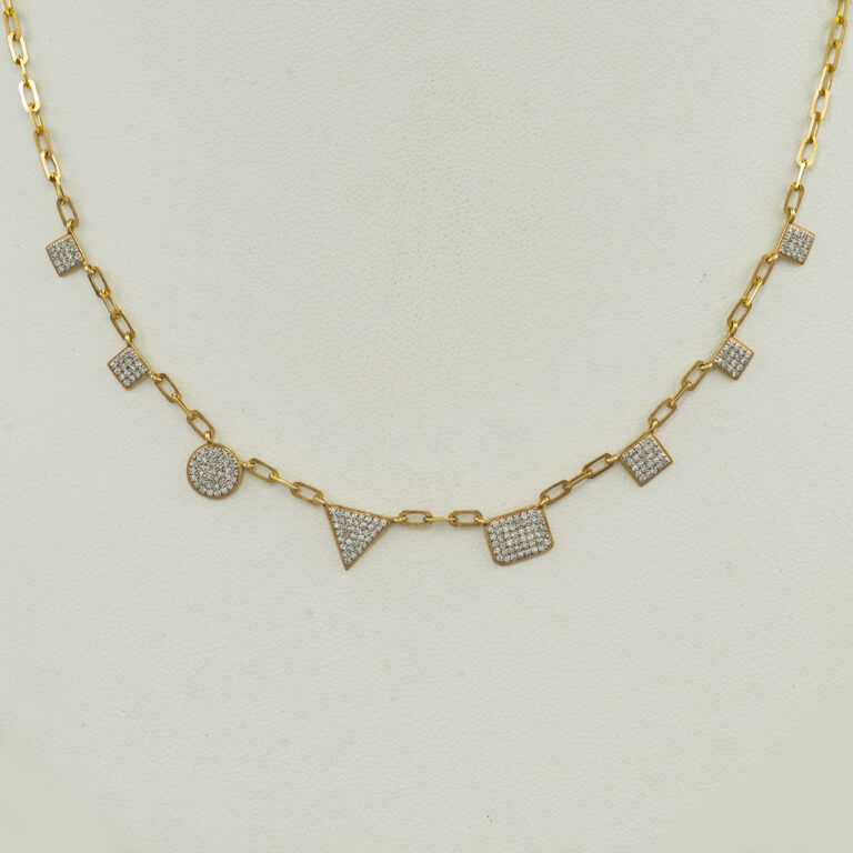 Here is a Meira T geometric necklace. The geometric charms have been set with round, brilliant-cut diamonds. All the diamonds have been set in 14kt yellow gold.