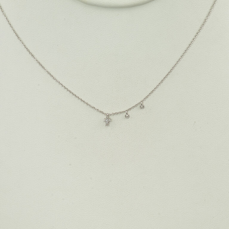 Here is a Meira T cross necklace. It has been made with 14kt white gold and diamonds. The length can be adjusted from 16", 17" or 18".