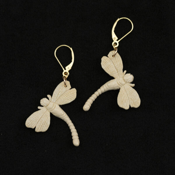 These carved dragonfly earrings have 14kt yellow gold leverbacks. The dragonflies have been carved out of fossilized mammoth ivory. 
