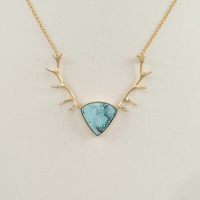 This blue moon turquoise necklace was made with 14kt yellow gold. It has a lobster claw clasp and is 18" in length. This is a one of a kind.