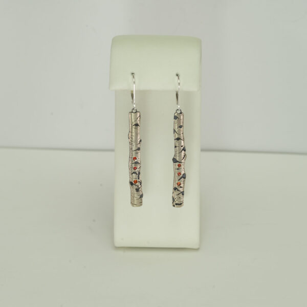 Here is a pair of aspen earrings with pink sapphires. This silver is Argentium and and the earrings have leverbacks. Hand made in America.