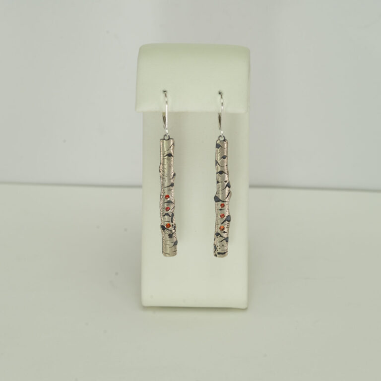 Here is a pair of aspen earrings with pink sapphires. This silver is Argentium and and the earrings have leverbacks. Hand made in America.