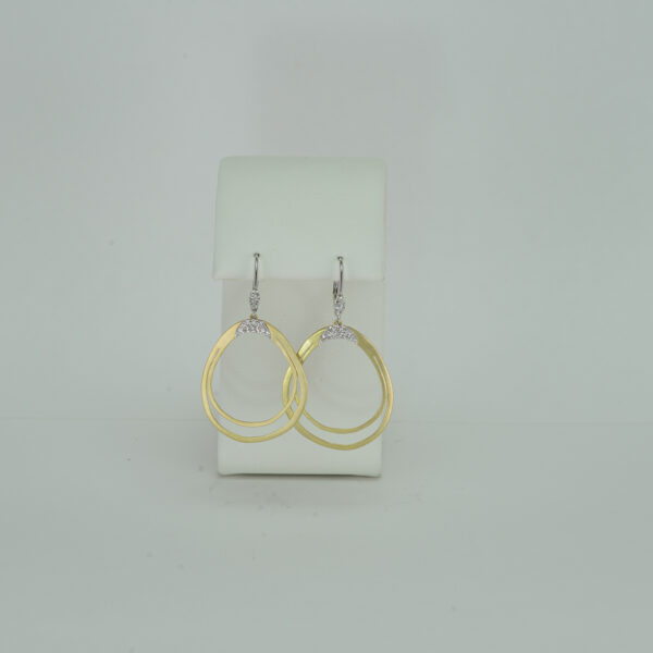 These large two tone earrings were designed by Meira T. The hoops are 14kt yellow gold and the leverbacks are 14kt white gold.