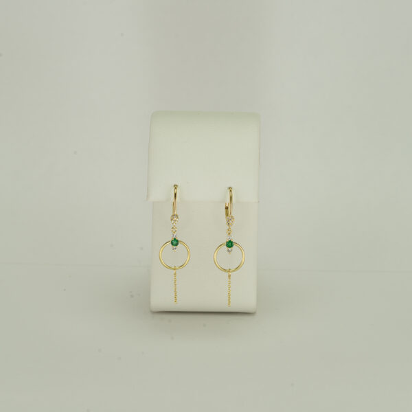 Here is a pair of emerald and diamond earrings. These earrings were designed and made by Meira T with 14kt yellow gold including the leverbacks.