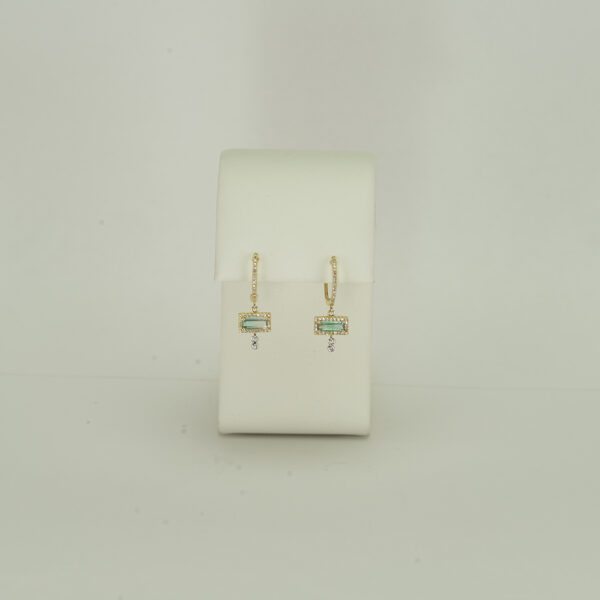 Here is a pair of Tourmaline earrings by Meira T. They have diamond accents. Both the tourmaline and the diamonds have been set in 14kt yellow gold.