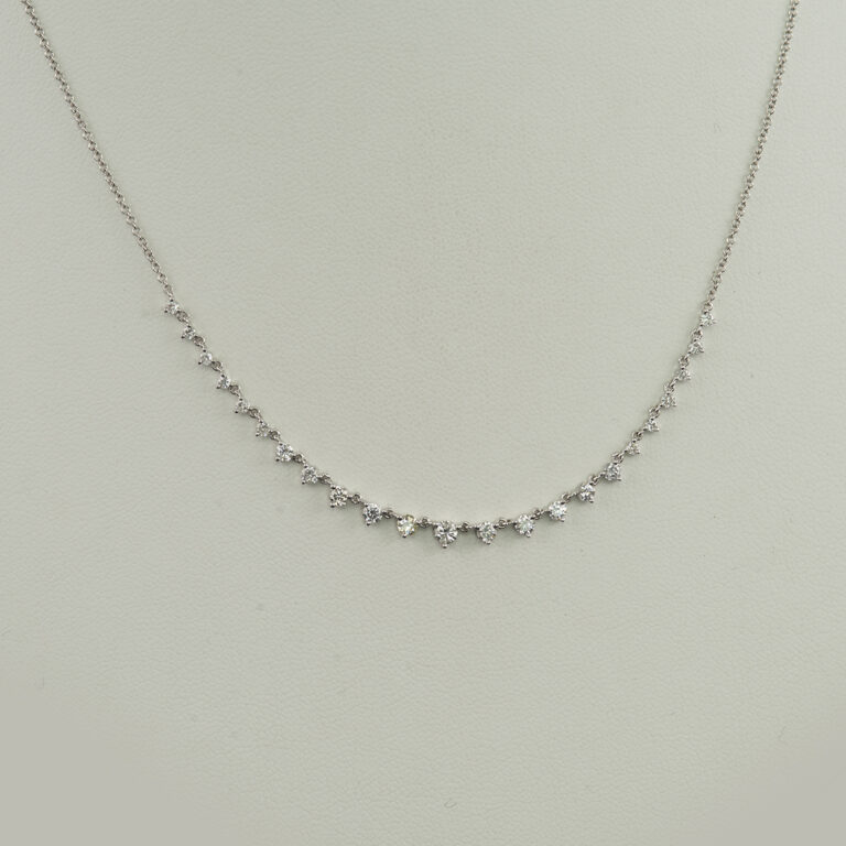 This is a diamond necklace by Meira T. The diamonds are round, brilliant cut. They have been set in 14kt white gold. The chain is adjustable in length.
