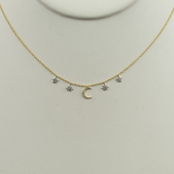 Here is a diamond crescent moon necklace by Meira T.  This necklace has both 14kt white and yellow gold. The "charms" have been paved with white diamonds. The chain is adjustable in length.