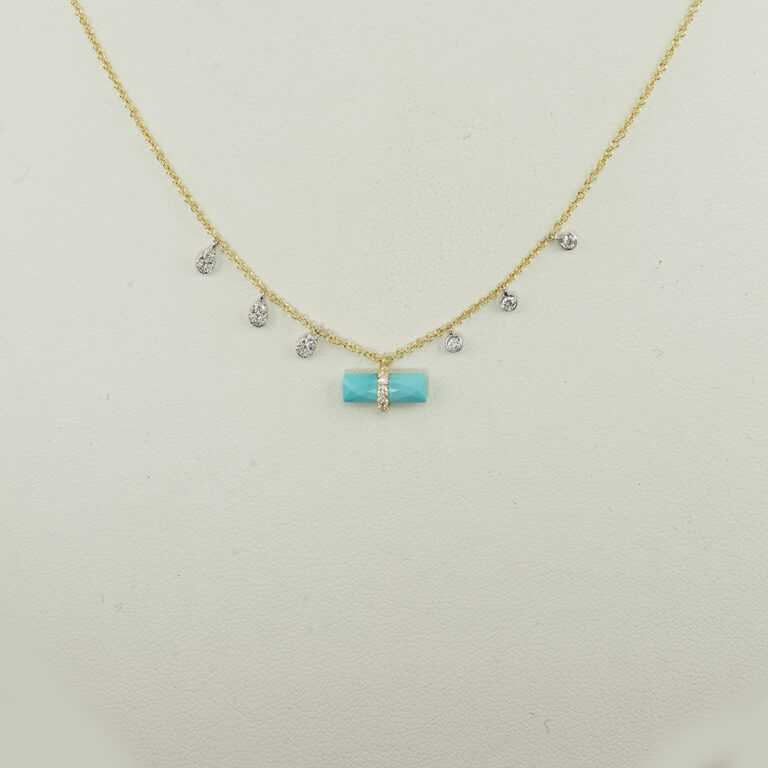 Here is a contemporary turquoise necklace by Meira T. It was made with turquoise, 14kt white gold, 14kt yellow gold and white diamonds.