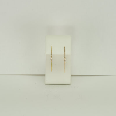 Connecting diamonds and gold bar stud earrings