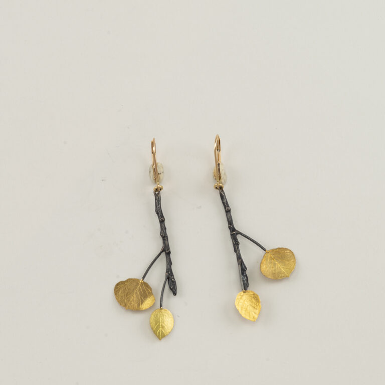 Here are the double aspen leaf earrings by Wolfgang. They have been made with sterling silver and 18kt yellow gold.