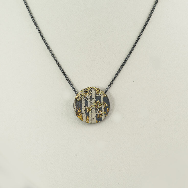 Here is an aspen pendant with argentium silver, sterling silver and gold nugget. The gold nugget is from Placerville California.