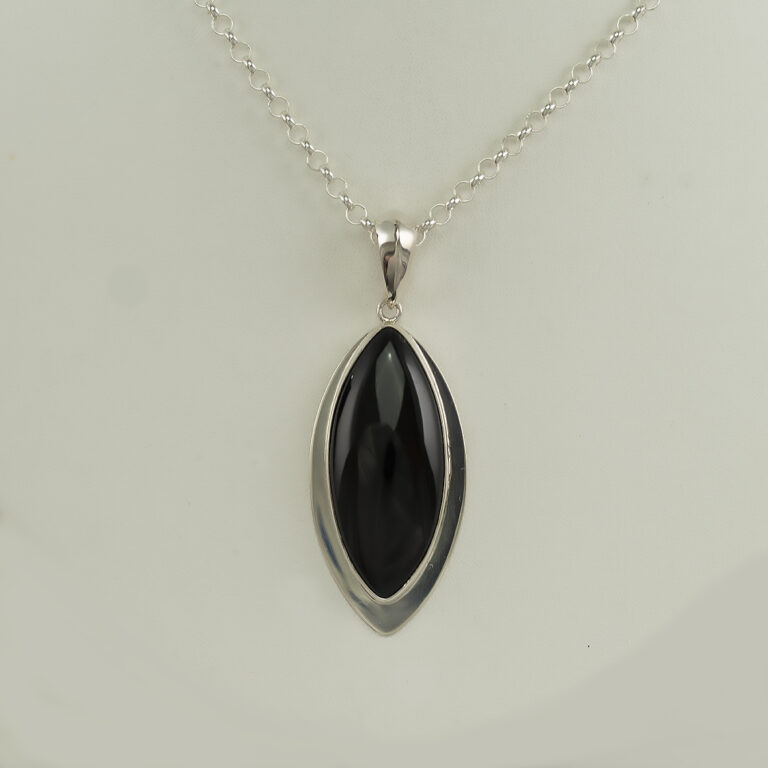 Here is a marquise black jade pendant. The black jade has been set in sterling silver. The chain is included in the price and has a lobster claw clasp.
