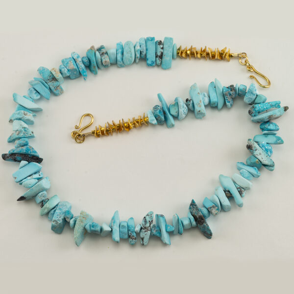 This Kingman and Sleeping Beauty turquoise necklace is 20" in length. The clasp and the gold discs are 14kt gold plate. This is a one-of-a-kind piece.