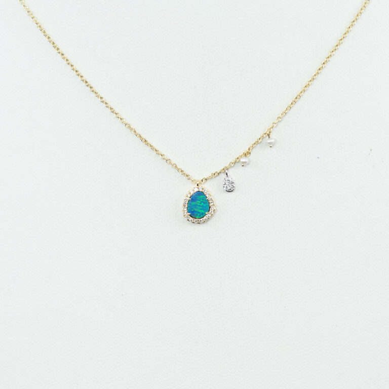 Here is a Meira T pendant with diamonds and opal. The diamonds are round, brilliant cut. The opal is a deep blue-green color. It has a lobster claw clasp.